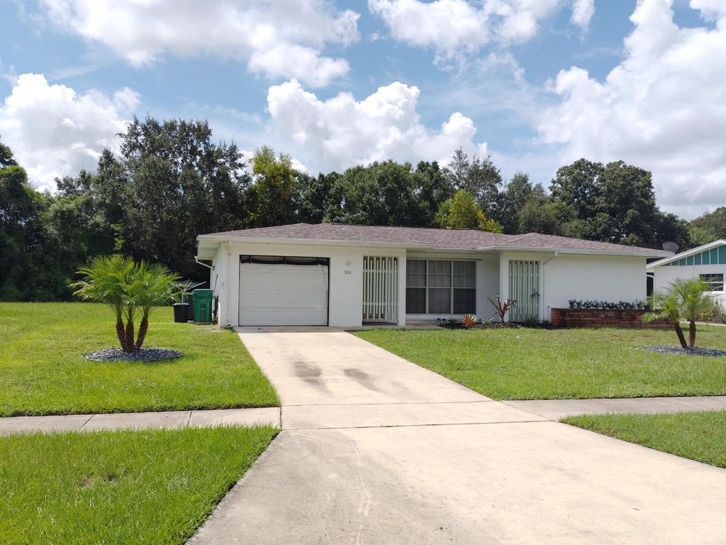 Photo of 300 NE Solida Drive, Port St Lucie, FL 34983 (MLS # R11020464)