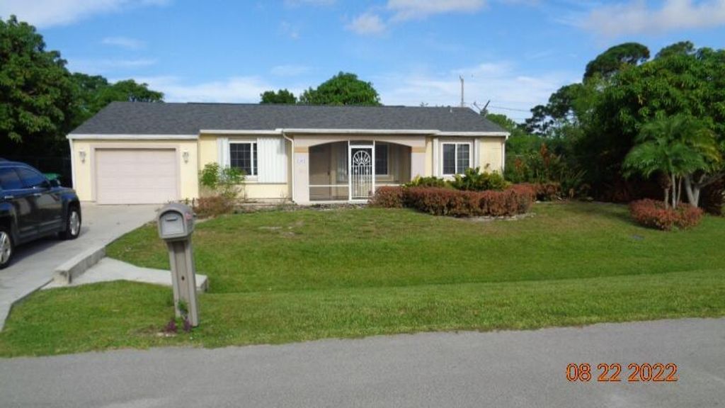 Photo of 2302 SE Merrill Road Rd, Port Saint Lucie, FL 34952 (MLS # R10826753)