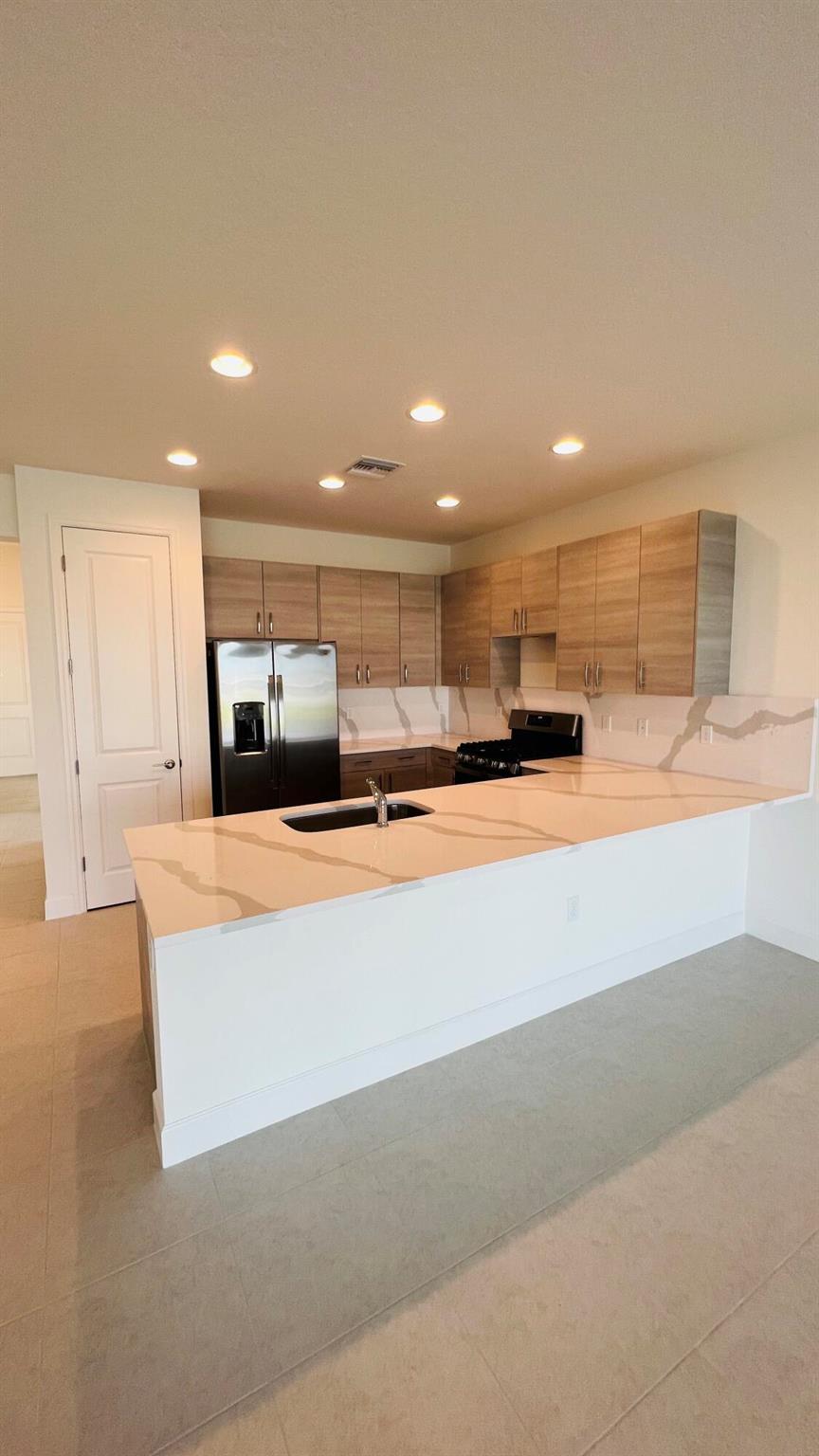 11664 SW River Crossing Place