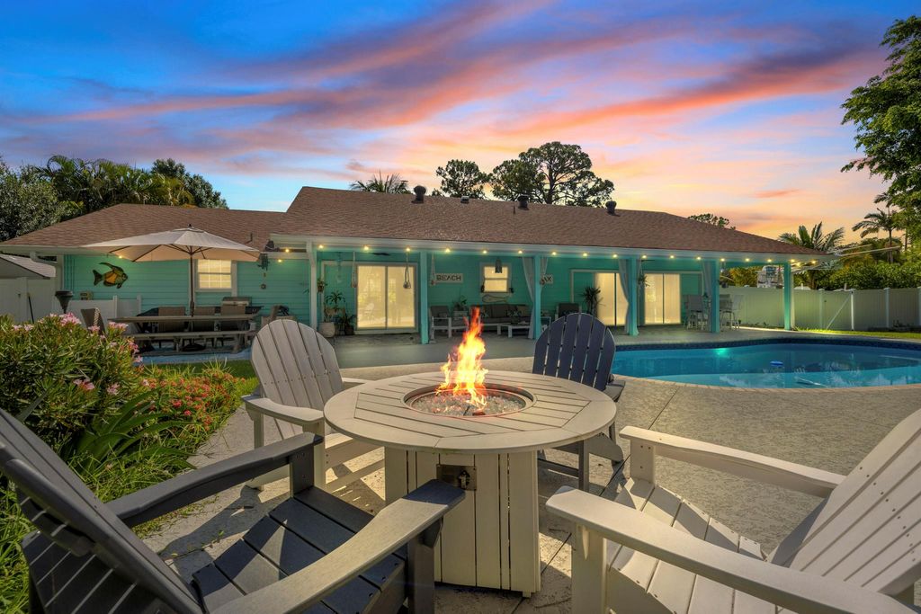 Photo of 1162 SW Pine Tree Lane, Palm City, FL 34990 (MLS # R11002437)