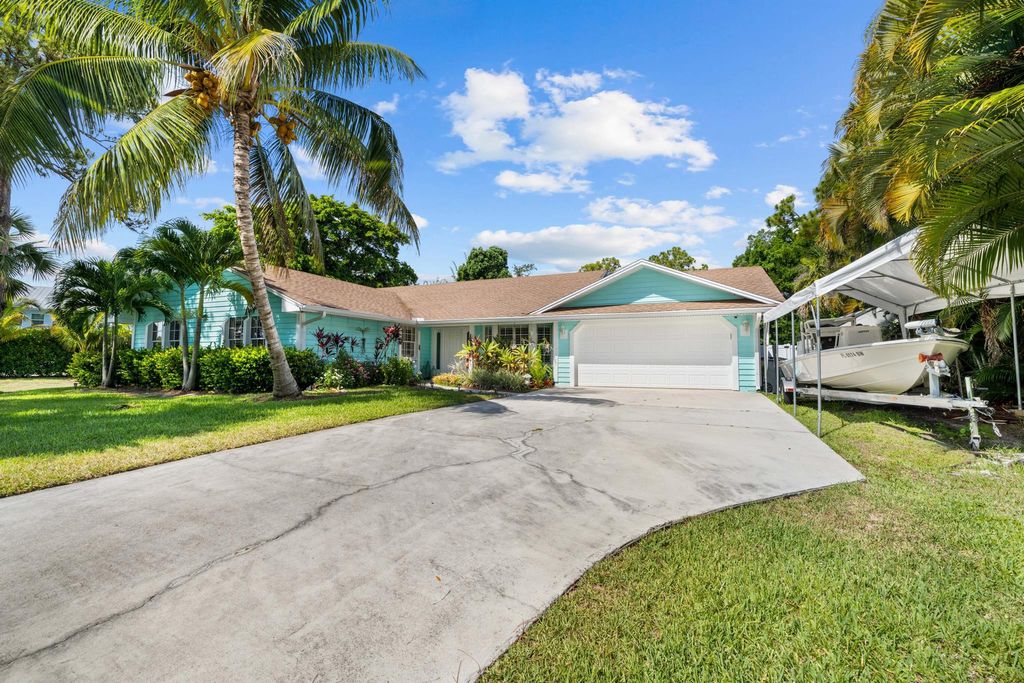 Photo of 1162 SW Pine Tree Lane, Palm City, FL 34990 (MLS # R11002437)