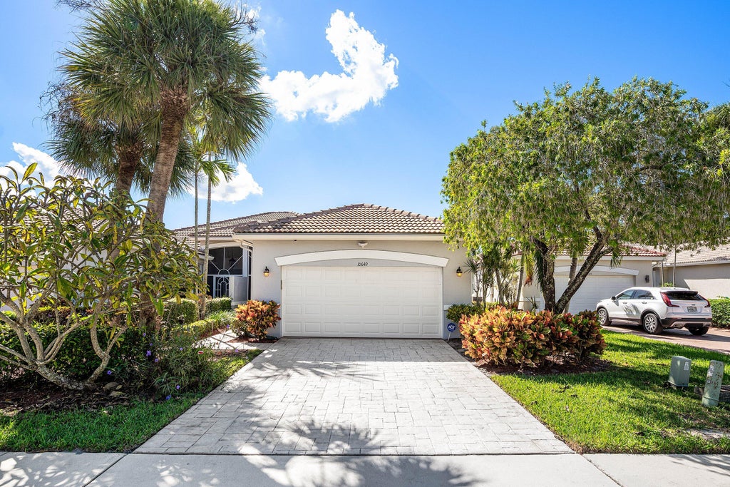 Photo of 10649 Royal Caribbean Circle, Boynton Beach, FL 33437 (MLS # B26091534)