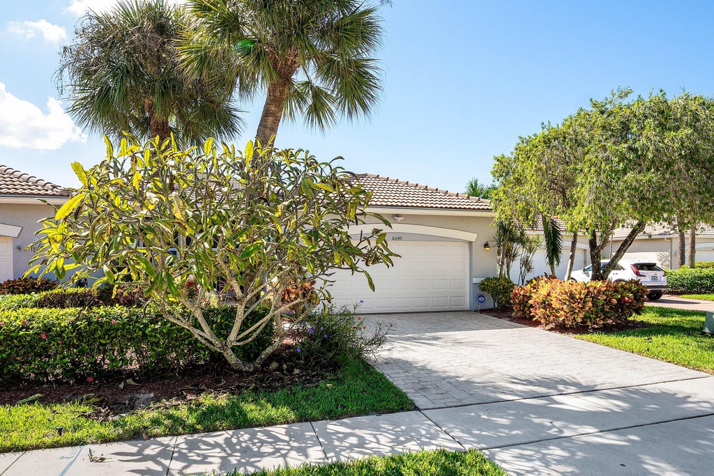 Photo of 10649 Royal Caribbean Circle, Boynton Beach, FL 33437 (MLS # B26091534)