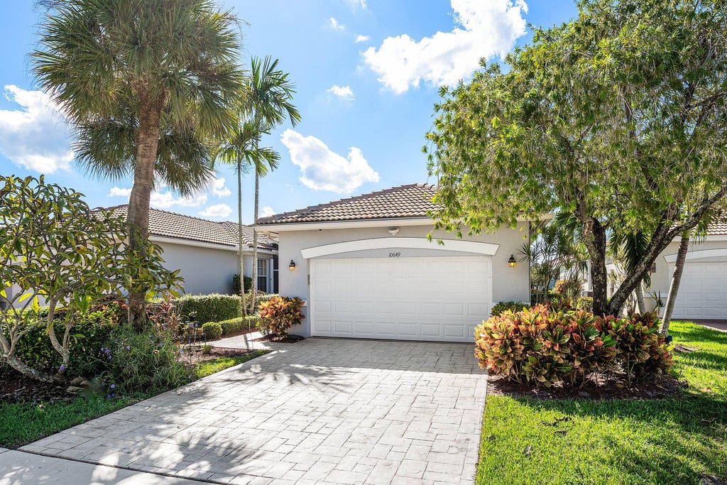 Photo of 10649 Royal Caribbean Circle, Boynton Beach, FL 33437 (MLS # B26091534)