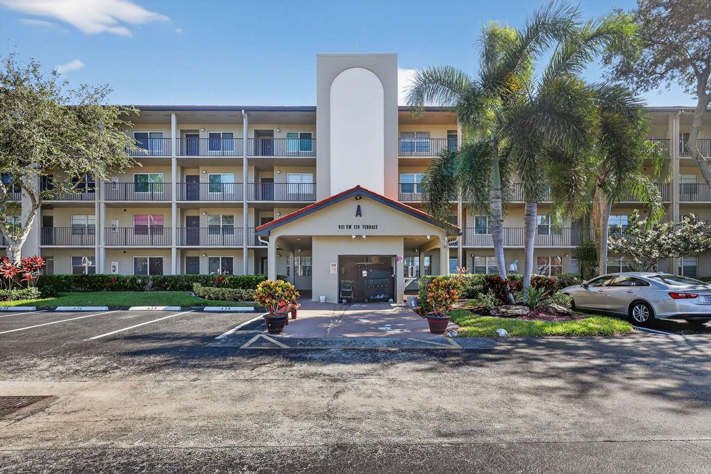 Photo of 901 SW 128th Terrace #211a, Pembroke Pines, FL 33027 (MLS # B26015347)