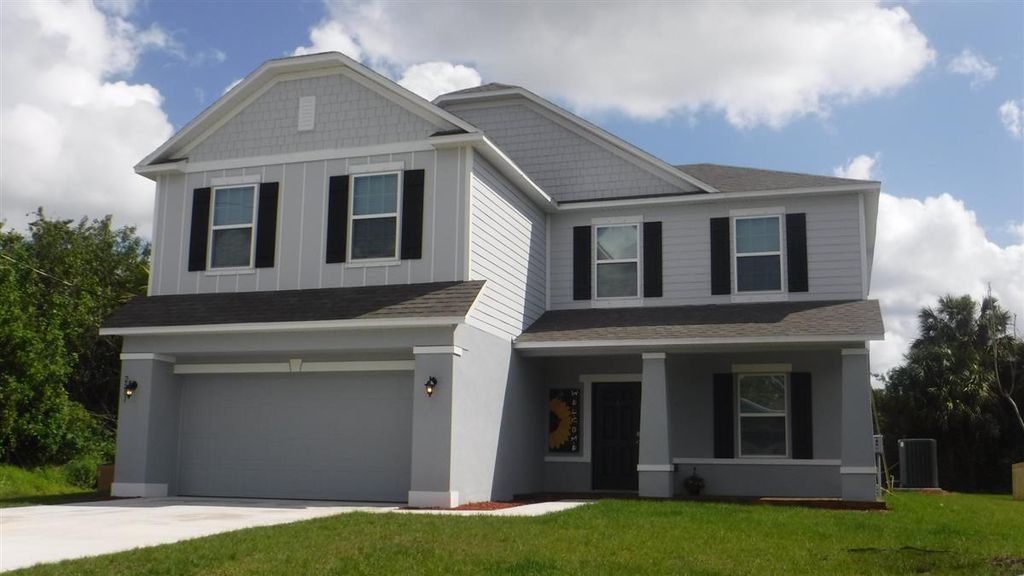 Photo of 2581 SW Westfield Street, Port Saint Lucie, FL 34953 (MLS # R10988987)