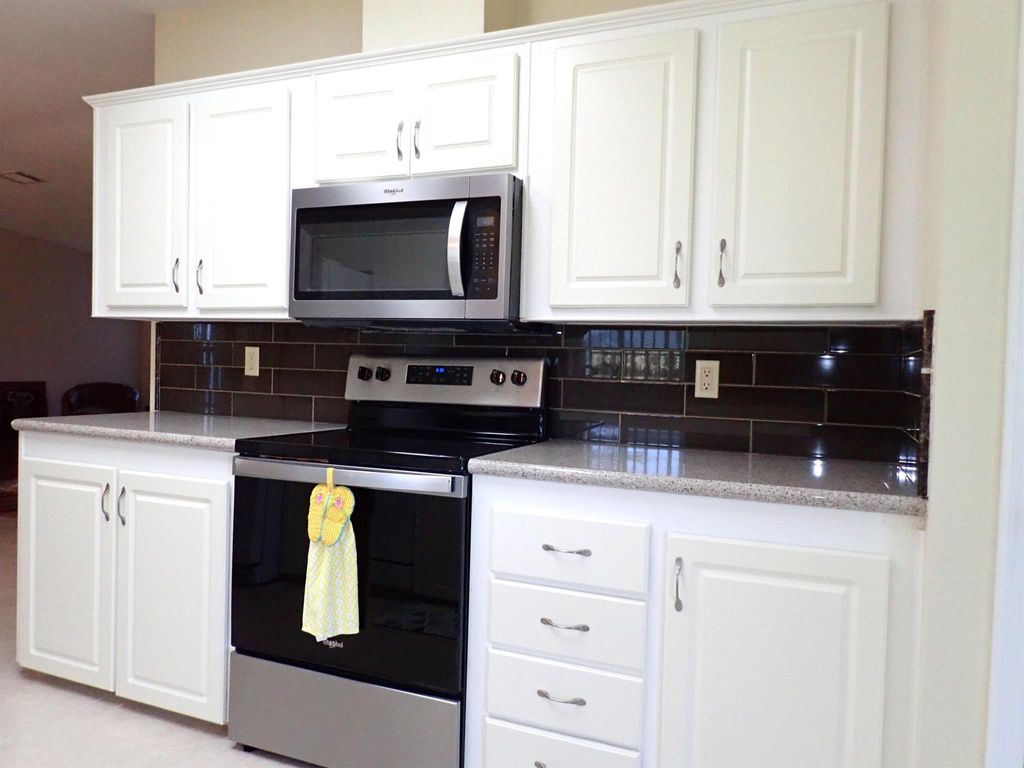 Photo of 8036 9th Hole Drive, Port Saint Lucie, FL 34952 (MLS # R10933946)