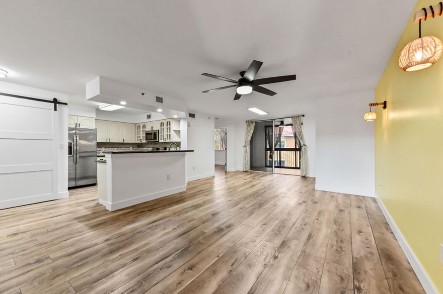 Welcome to this beautifully updated 3 bedroom, 2 bathroom condo located in a gated Intracoastal community in Hypoluxo. This spacious unit features elegant vinyl flooring throughout and a modern kitchen with granite countertops, creating a bright and inviting living space. Enjoy the convenience of an in unit washer and dryer along with a 1 car attached garage and additional driveway parking. Residents enjoy resort style amenities including a pool, spa, fitness center, clubhouse, and a private sandy beach along the Intracoastal Waterway. This well maintained community offers the perfect balance of comfort and coastal living. Ideally located just minutes from beaches, dining, and shopping throughout Palm Beach County.