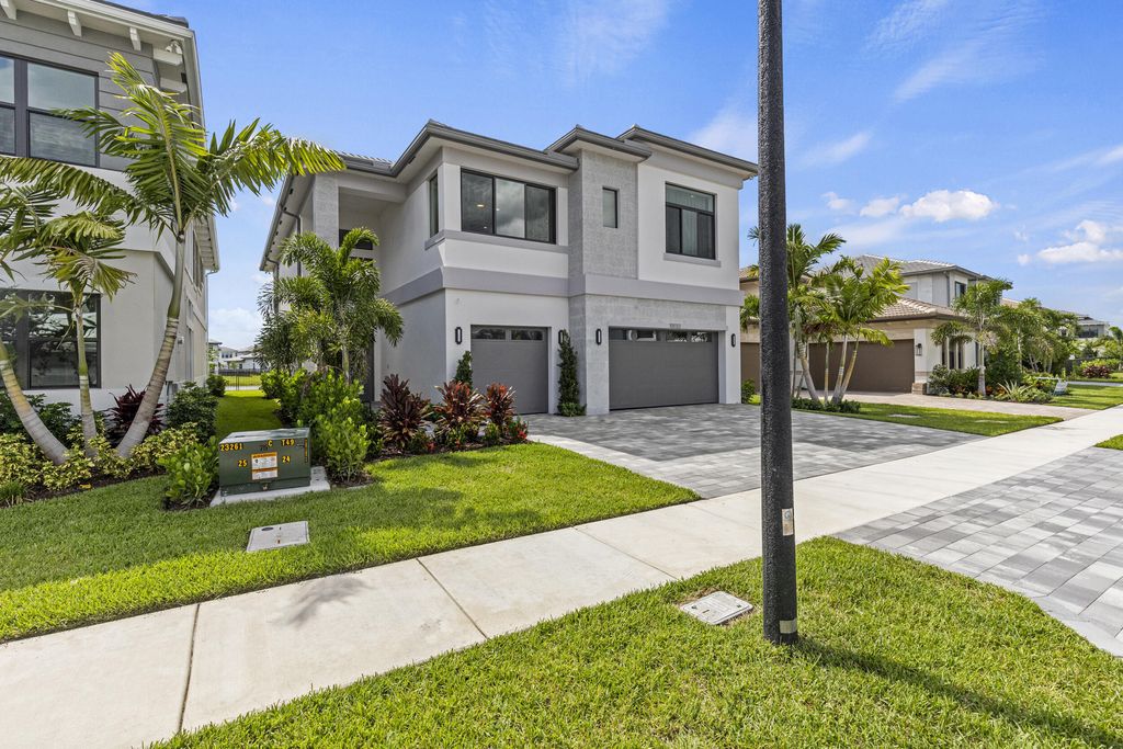 Photo of 10033 Stockrun Drive, Palm Beach Gardens, FL 33412 (MLS # B26019114)