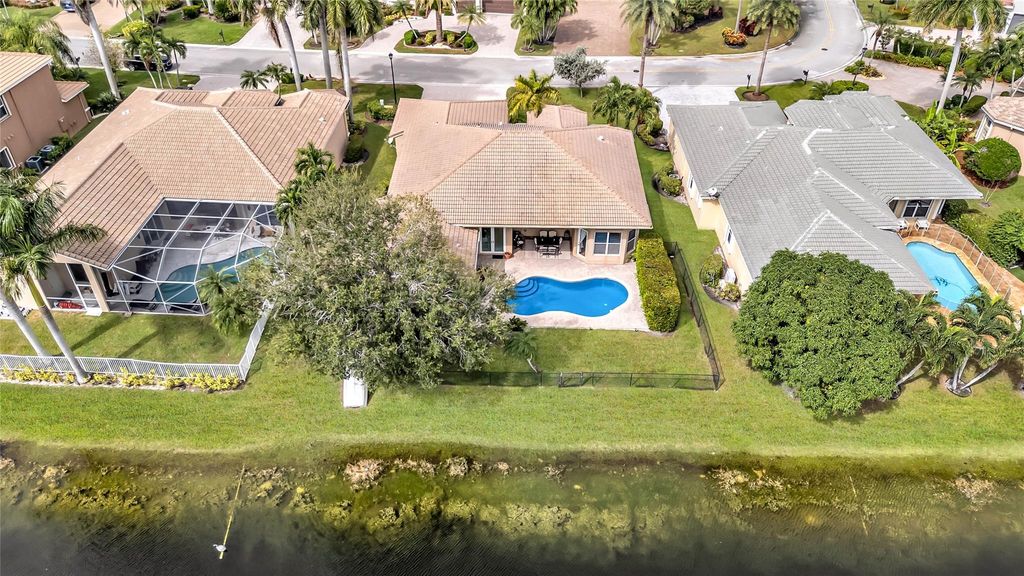 Photo of 12040 NW 49th Dr, Coral Springs, FL 33076 (MLS # F10538138)