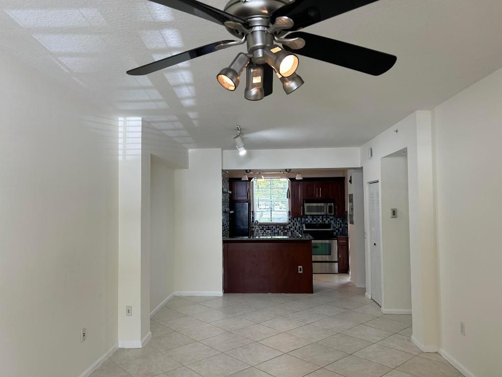 Photo of 4822 Chancellor Drive #10, Jupiter, FL 33458 (MLS # R10975363)