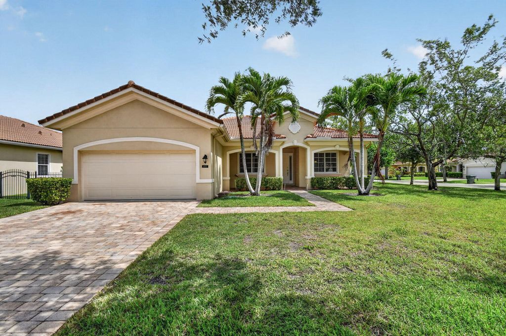 Photo of 6810 Osage Circle, Greenacres, FL 33413 (MLS # B26032348)