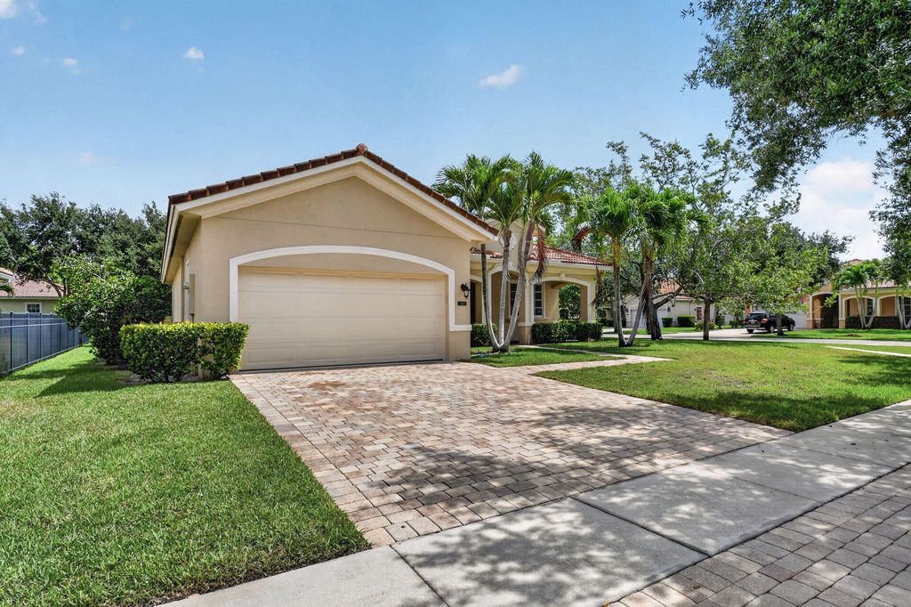 Photo of 6810 Osage Circle, Greenacres, FL 33413 (MLS # B26032348)
