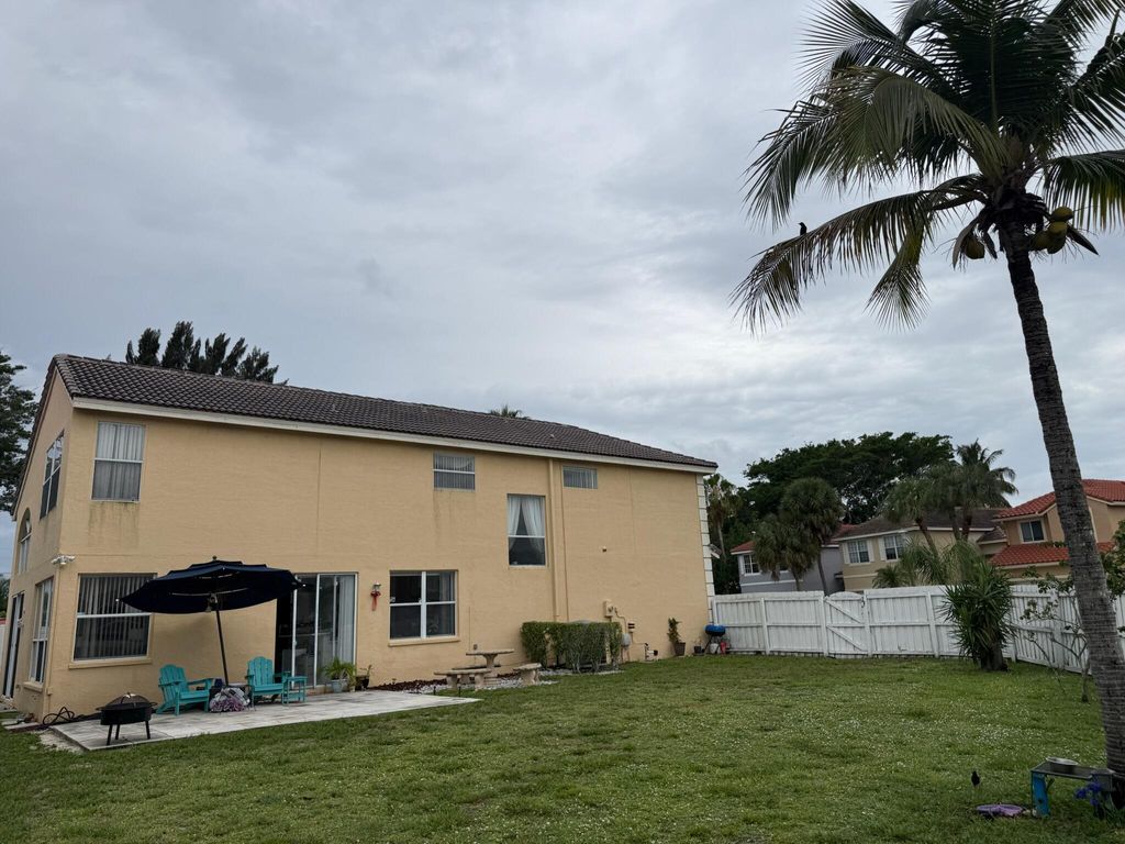 Photo of 7418 Wescott Terrace, Lake Worth, FL 33467 (MLS # B26036619)