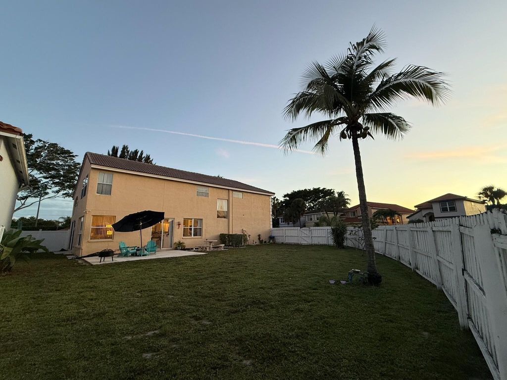 Photo of 7418 Wescott Terrace, Lake Worth, FL 33467 (MLS # B26036619)