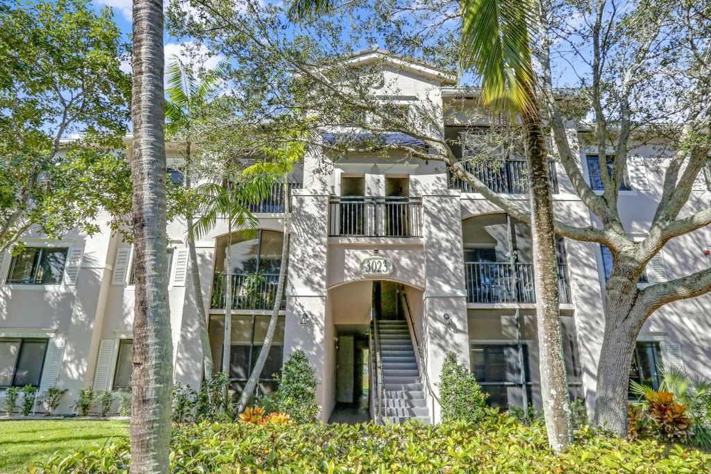 Photo of 3023 Alcazar Place #102, Palm Beach Gardens, FL 33410 (MLS # R10982603)