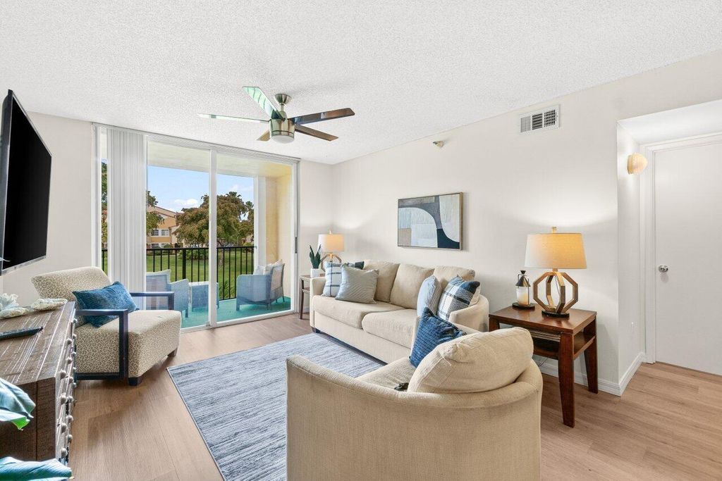 Photo of 127 Yacht Club Way #206, Hypoluxo, FL 33462 (MLS # R11135583)