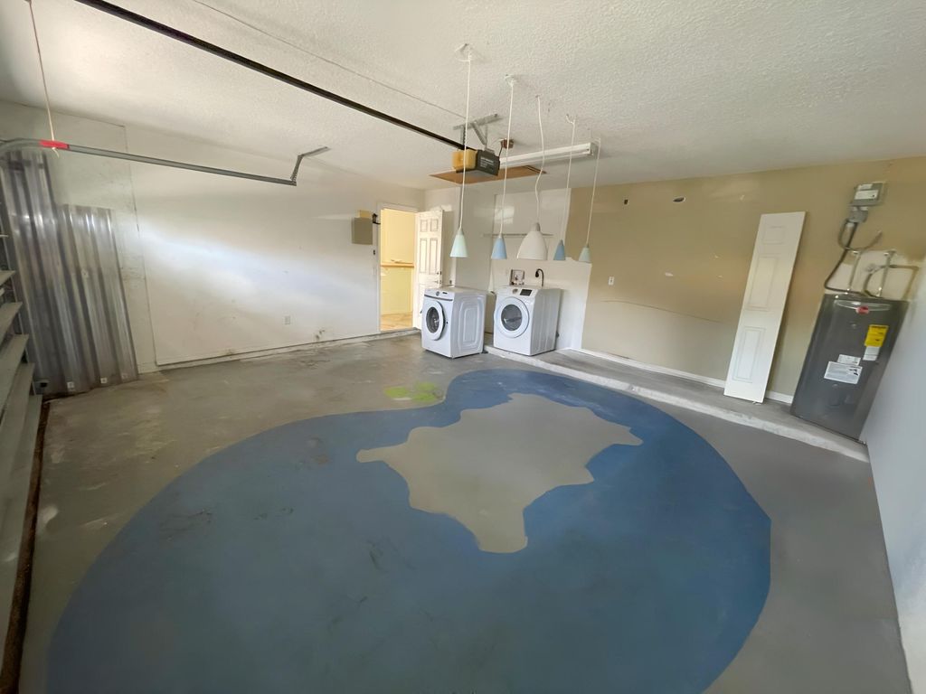 Photo of 5338 Edenwood Lane, Riviera Beach, FL 33418 (MLS # B26007535)