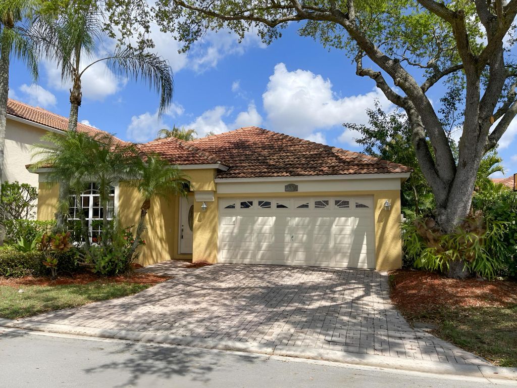 Photo of 5338 Edenwood Lane, Riviera Beach, FL 33418 (MLS # B26007535)