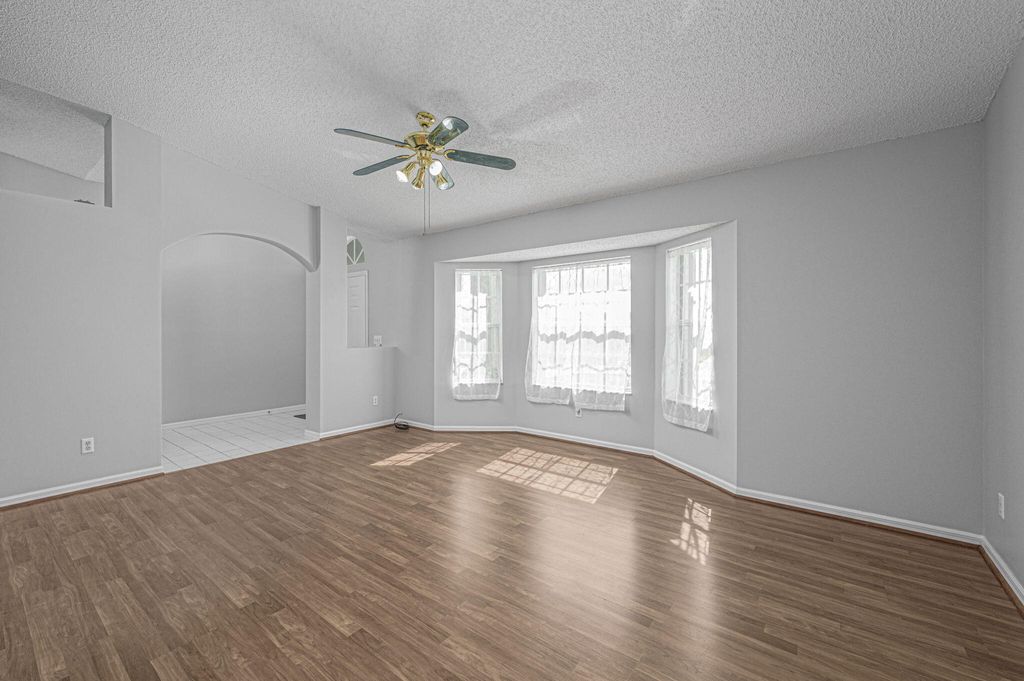 Photo of 407 SW Laconic Avenue, Port Saint Lucie, FL 34953 (MLS # R10959012)