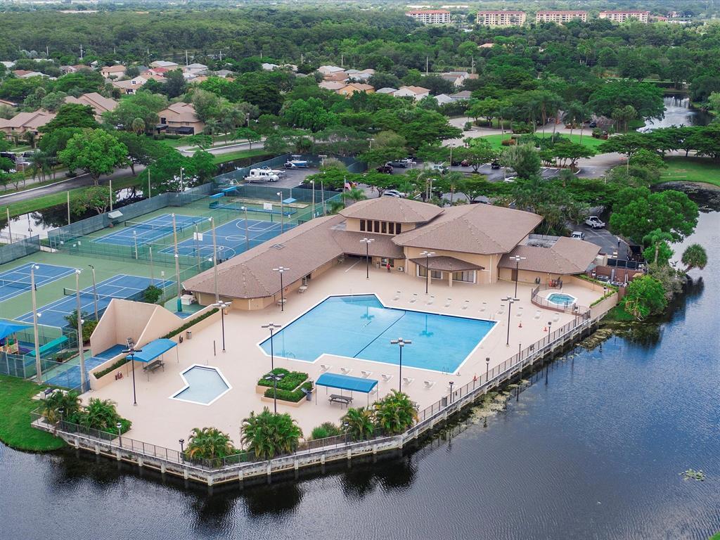 Photo of 3840 NW 23RD Place, Coconut Creek, FL 33066 (MLS # B26064336)