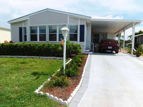 Photo of 243 Sea Conch Place, Fort Pierce, FL 34982 (MLS # B26060033)