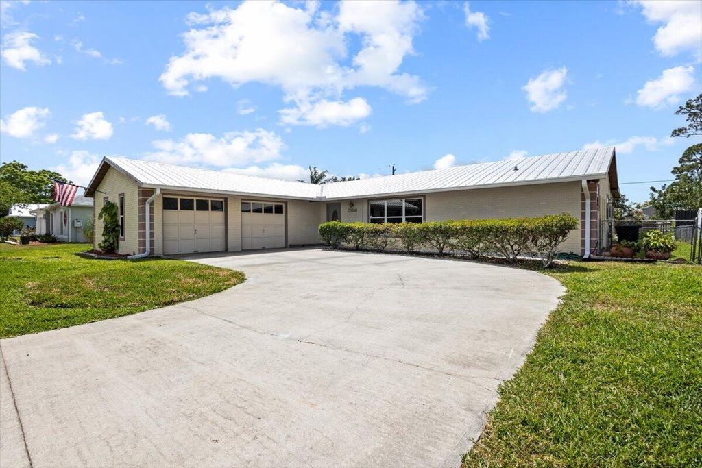 Photo of 286 NE Granduer Avenue, Port Saint Lucie, FL 34983 (MLS # R11084978)