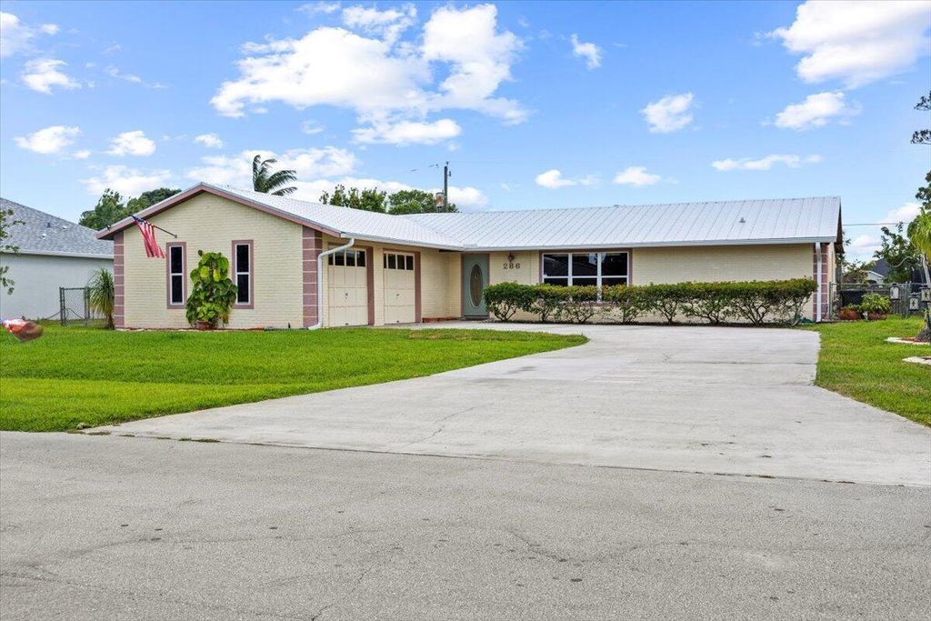 Photo of 286 NE Granduer Avenue, Port Saint Lucie, FL 34983 (MLS # R11084978)