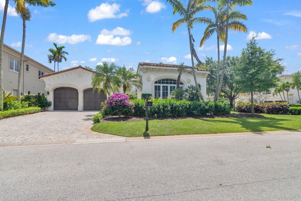 Photo of 11202 Orange Hibiscus Lane, Palm Beach Gardens, FL 33418 (MLS # B26017618)
