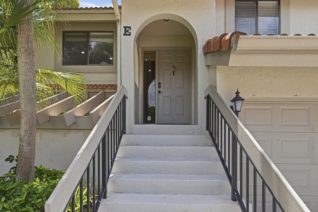 Photo of 5530 Coach House Circle, Boca Raton, FL 33486 (MLS # B26030641)