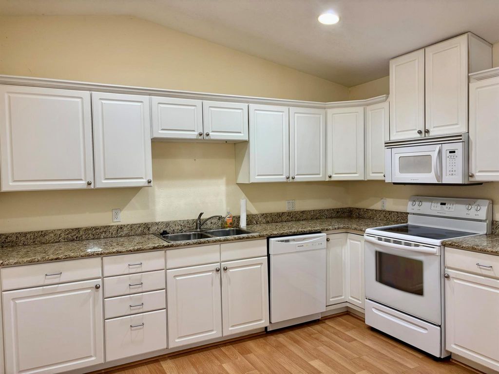 Photo of 1563 Pheasant Walk #C, Fort Pierce, FL 34950 (MLS # R11111894)