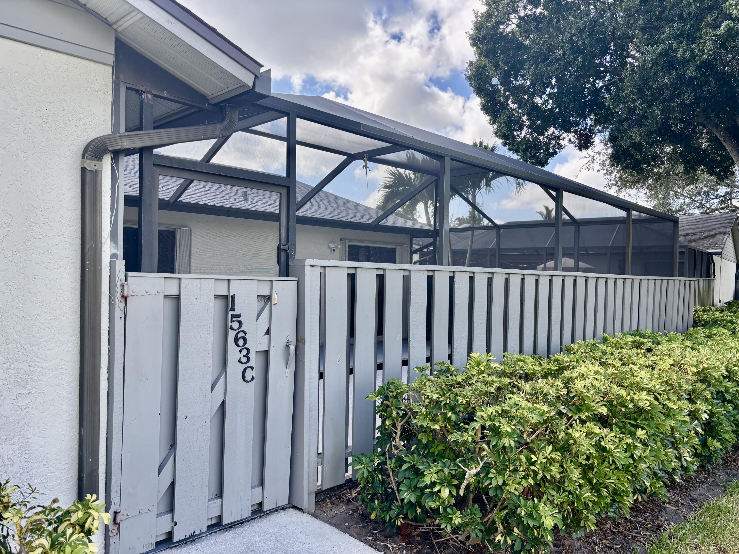 This charming 2 bedroom 2 bath Garden Villa is centrally located in the heart of Fort Pierce and is move in ready! The villa is nestled on a corner lot located on caul-de-sac for added privacy. As you stroll up the walkway you are greeted by the large, private screened lanai perfect for outdoor entertaining. The large community oaks provide shade on those hot days. The Split bedroom floor plan is anchored by the central Living Room overlooking the well equipped kitchen. Baths have been nicely updated and we offer a nice interior laundry for your convenience. Storm accordion shutters for easy preparation are included. Short distance to the community amenities. Come enjoy our lovely Downtown Farmer's Market and more! Detailed photos coming soon.