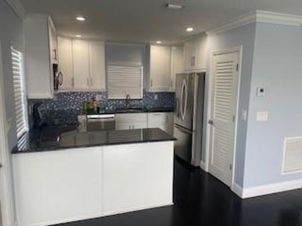 Photo of 110 Wettaw Ln, North Palm Beach, FL 33408 (MLS # F10450155)