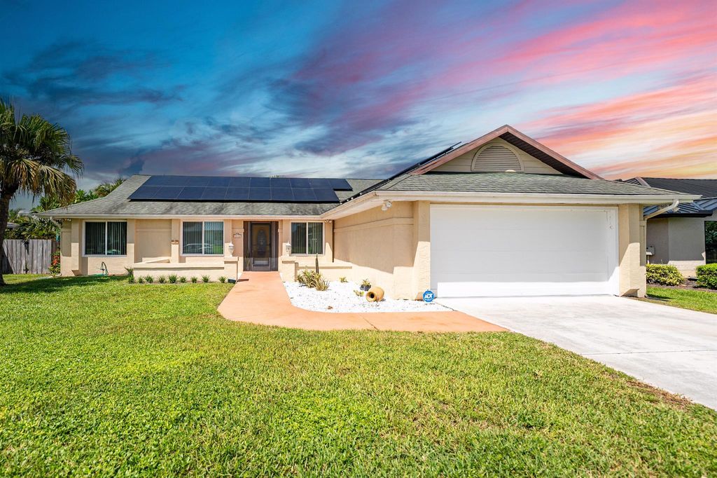 Photo of 1938 SE Doverbrook Street, Port Saint Lucie, FL 34983 (MLS # R11023450)