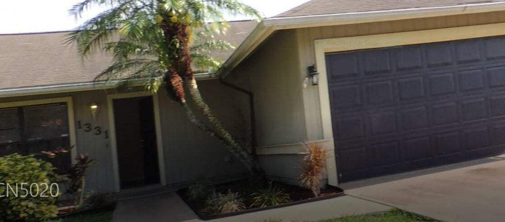 Photo of 1331 SW Bellevue Avenue, Port Saint Lucie, FL 34953 (MLS # R11009673)