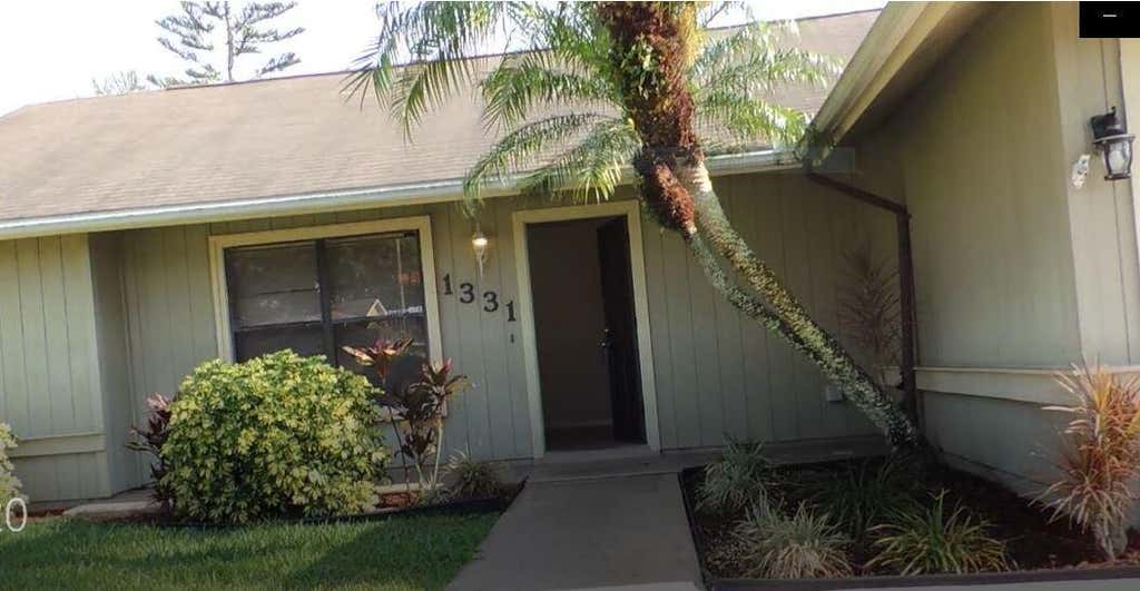 Photo of 1331 SW Bellevue Avenue, Port Saint Lucie, FL 34953 (MLS # R11009673)