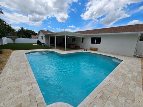 Tiny photo for 1058 NW 6th Drive, Boca Raton, FL 33486 (MLS # B26032510)
