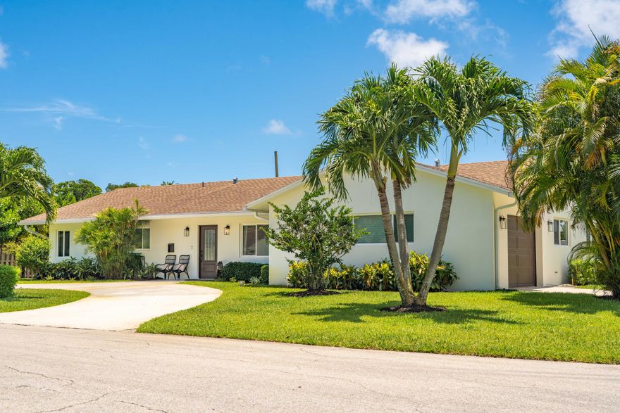 Welcome to this exquisitely updated 5BD/4.5BA home in the heart of Boca Raton, located within the highly sought-after Addison Mizner School District. Situated on an oversized 10,400 + sq ft lot, this exceptional residence offers the perfect blend of luxury, functionality,  & indoor-outdoor living. Thoughtfully designed for both everyday living and entertaining, 4 bedrooms feature private ensuite baths, creating an ideal layout for family and guests.  At the center of the home is the beautifully designed chef's kitchen featuring a large island, custom paneled appliances, built-in refrigerator, induction cooktop, pantry, bar seating, and a filtered chilled water system at the sink. Filled with incredible natural light, the kitchen opens seamlessly to the main living areas and covered patio.  The dining room showcases custom built-ins and a beverage fridge, perfect for entertaining.  The spacious primary suite offers a spa-inspired retreat complete with a freestanding soaking tub, oversized walk-in shower, private water closet, and oversized custom walk-in closet. The versatile 5th bedroom is ideal as a media room, playroom, or guest suite with sliders to the patio, custom built-ins, and additional storage.  High-end upgrades throughout include impact windows and doors, hand-scraped wood floors, designer lighting, custom moldings, updated interior doors and hardware, electric fireplace feature wall, custom closets and built-ins, indoor laundry room, lined cast iron pipes, entire-home water filtration and softening system, roof replaced in 2017, and new AC installed in 2026 with UV light technology.  Step outside to your private backyard oasis featuring a remodeled pool with updated tile, new skimmer and pump, expansive covered patio, fully fenced turf yard, and plenty of space to relax, entertain, and play.  Get ready to make this your new home and enjoy the awesome South Florida lifestyle.