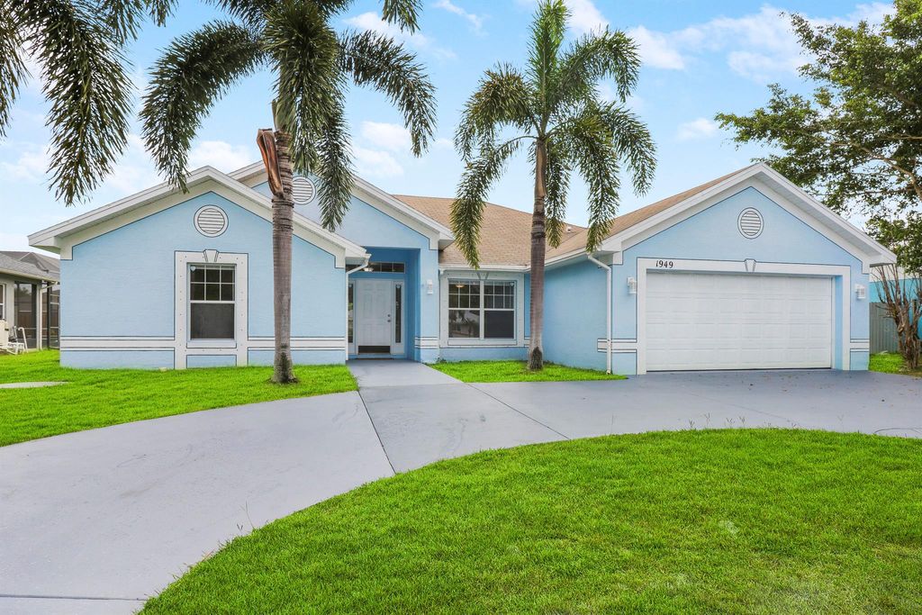 Photo of 1949 SE Airoso Boulevard, Port St Lucie, FL 34984 (MLS # R10907762)