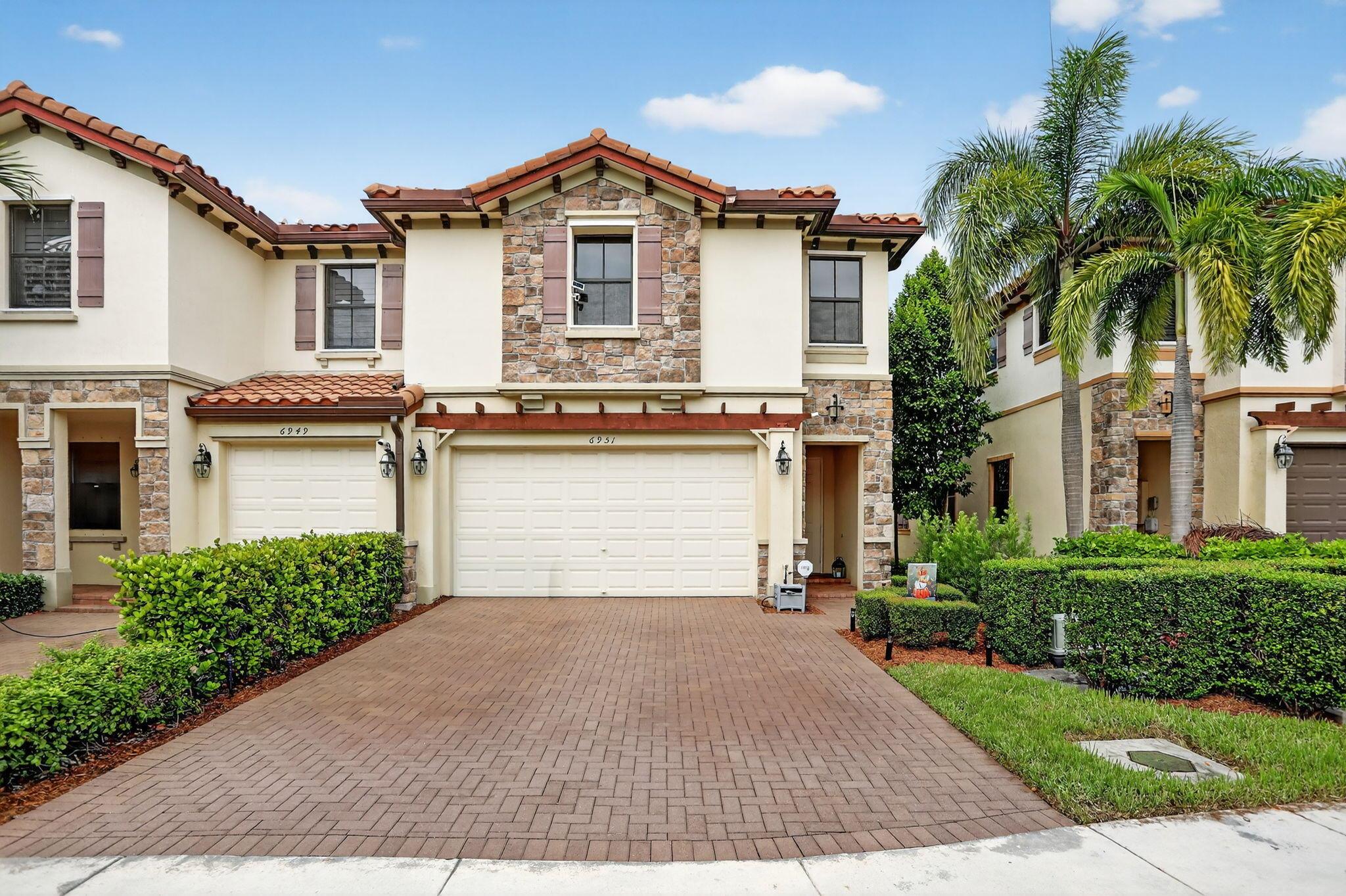 Spacious & inviting, this townhome built in 2017 offers the perfect combination of style, comfort, & functionality. All tiled living areas & a modern white kitchen featuring granite countertops, SS appliances, a center island, & plenty of cabinetry. The layout includes a formal living room, family room & dedicated dining area. Outdoor patio & yard space allows for relaxing, entertaining, or weekend barbecues. Under-stairs nook, currently used as a cozy dog bedroom, adds extra charm & functionality. Upstairs, you'll find a master suite complete with dual sinks, wet closet, roman tub & separate shower. Large walk in closet has custom shelving and organizers. Equipped with a newer AC with UV light for enhanced air quality & efficiency, this home has it all-