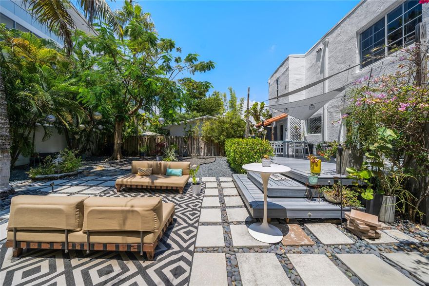 Beautiful 3 bed 2 bath just one block from Design District. This cozy home is centrally located to all of Miami's best areas, perfect for anyone relocating. The house has been very well maintained and features some lovely upgrades. First floor you will find the kitchen, living room, dining room and full bathroom. Second floor features 3 bedrooms and one full bathroom. Backyard is extremely spacious and well designed. The driveway can fit 3 cars comfortably.