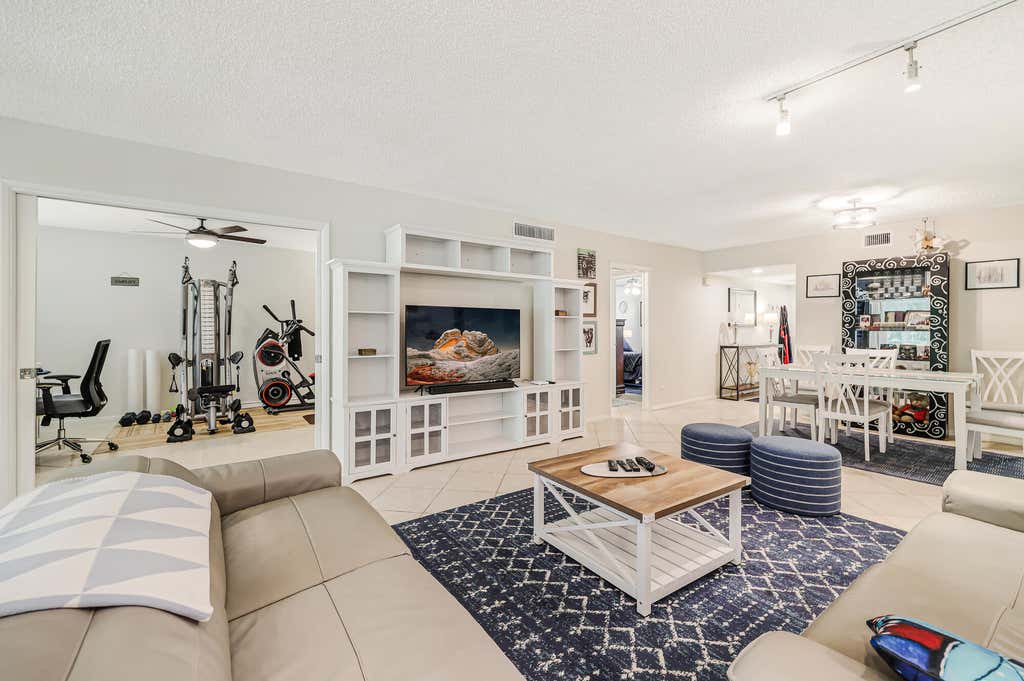 Photo of 933 Cypress Grove Drive #103, Pompano Beach, FL 33069 (MLS # B26056540)