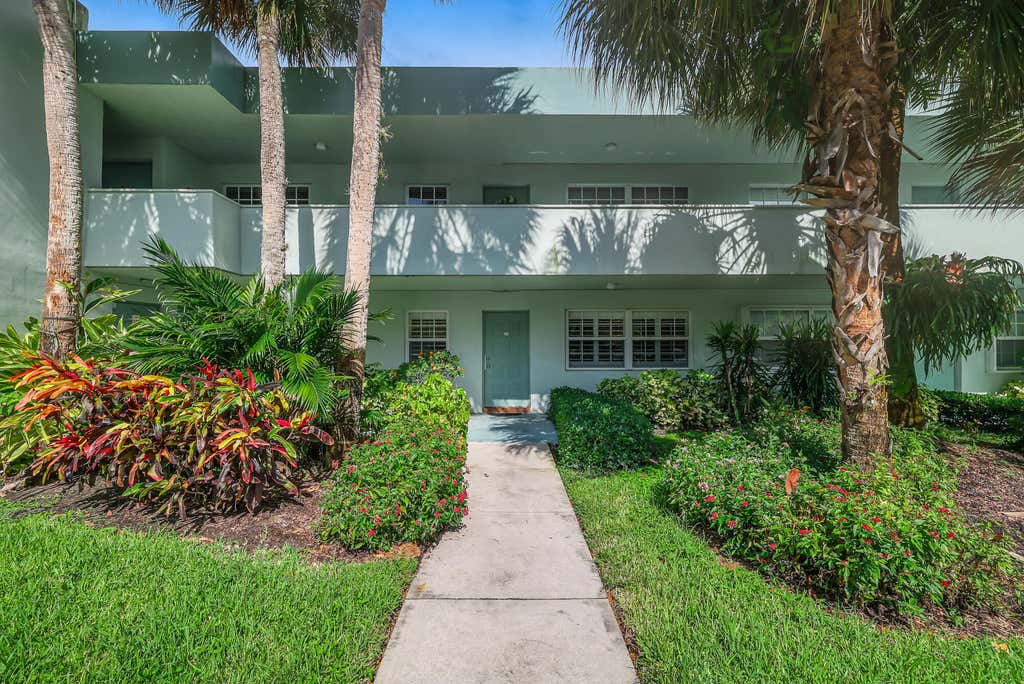 Photo of 933 Cypress Grove Drive #103, Pompano Beach, FL 33069 (MLS # B26056540)