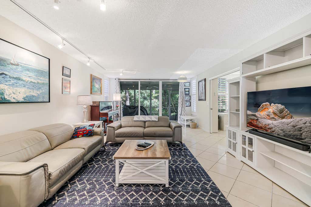 Photo of 933 Cypress Grove Drive #103, Pompano Beach, FL 33069 (MLS # B26056540)