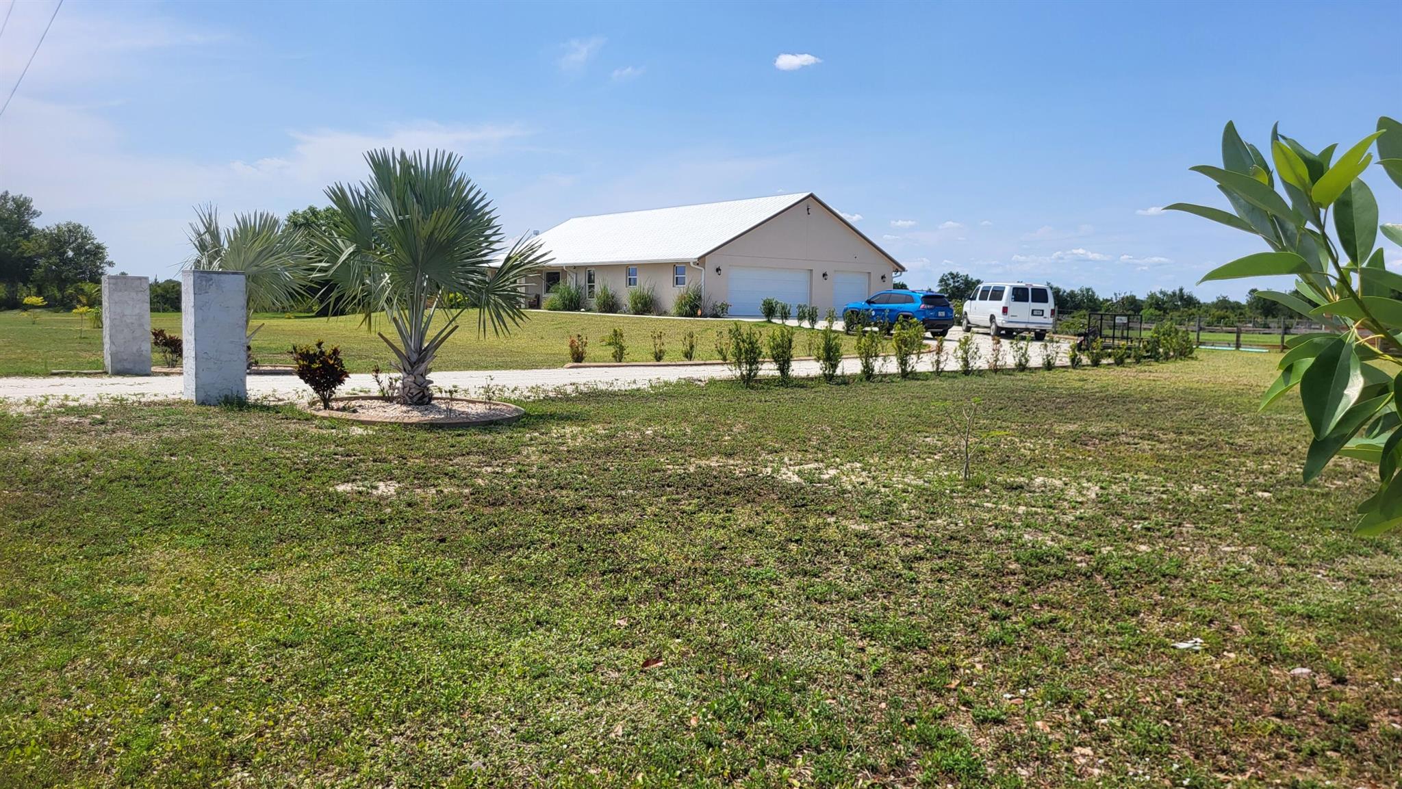 DREAM HOUSE ON THE PRAIRIE! Landscaped, Fenced-in back yard with a Stocked Fish Pond (Gazebo & Water Feature too), Impact Sliding Door & Windows, Metal Roof, Generac w/250 gal Propane Tank, Camera Security System, massive Garage with ample Shelving, Utility Tub, Insulated Doors, Central Vac, Attic, Tankless HW, Outside Shower, Tiled Patio, Truck Gate, 2nd Well for 10-zone irrigation system and pond filling, Fruit Trees, Fire Pit , Strong WIFI. Also, Granite Countertops, Luxury Vinyl flooring, Vaulted Ceiling, Wood self-close Cabinets, Gas Fireplace and beautifully Tiled Bathrooms. No expense spared in this 2022 build AND it sits 12'' higher than code. making ''High & Dry' an understatement. Take special notice of the Bird-Feeding area in the front right corner. YOUR DREAM JUST CAME TRUE!