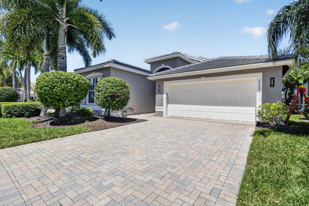 Photo of 7760 Lighthouse Point Lane, Lake Worth, FL 33467 (MLS # B26053334)