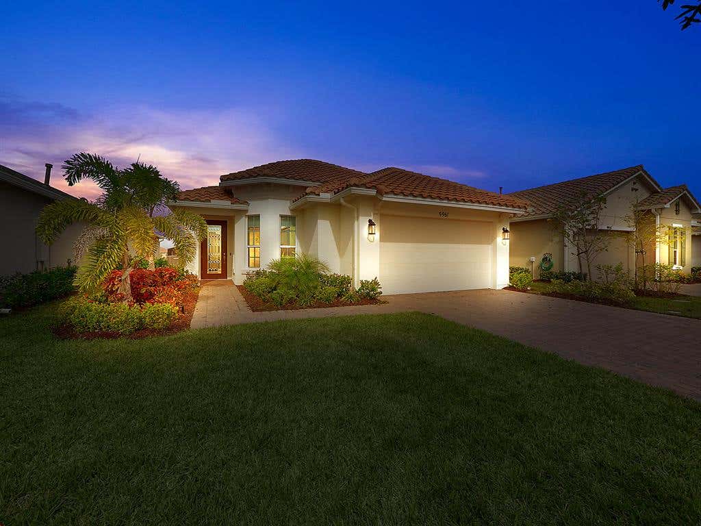 Photo of 9961 SW Trumpet Tree Circle, Port Saint Lucie, FL 34987 (MLS # R10672652)