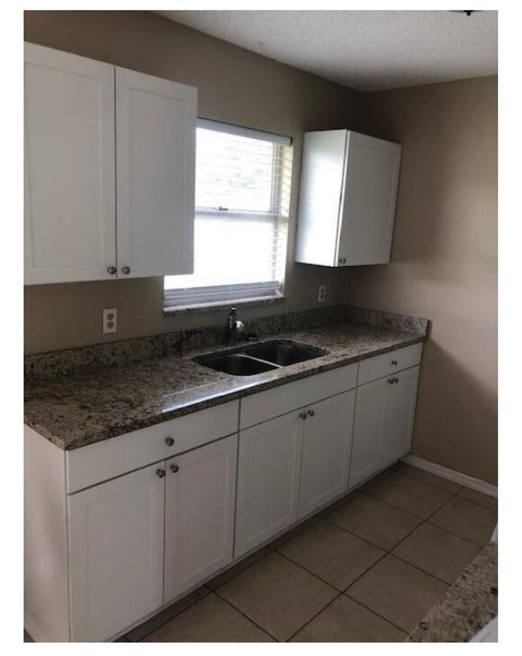 Photo of 1125 SW Colorado Avenue, Port Saint Lucie, FL 34953 (MLS # R11078563)