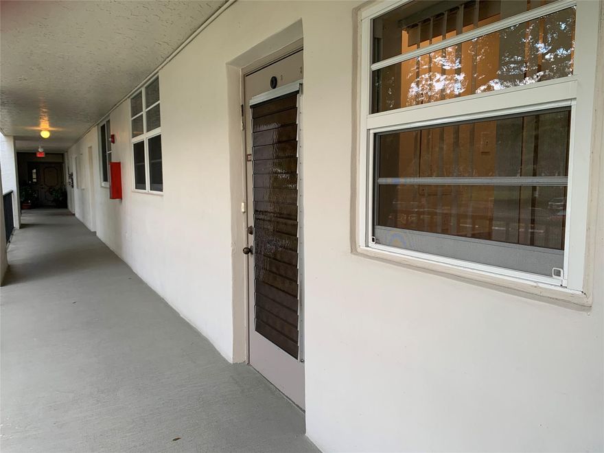 This is a lovely condo located in the well sort after community of Pine Island Ridge.   Impact windows, A/C 2023, quartz countertops in the kitchen, tankless hot water heater, with an enclosed patio.  It does need partial flooring.    Access to the private Country Club (Included in the maintenance fee), two restaurants, golf, tennis, pickle ball, lovely nature path across from the Country Club and many additional fun activities.  Monthly maintenance fee of $561.09, plus an additional charge for the special assessment of $68.86 (Ending 2042).  Lock Box is in front of the condo door attached to the railing.