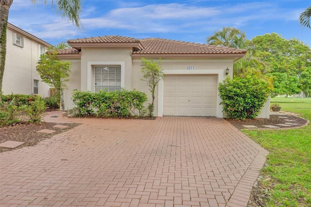 Photo of 6211 NW 38th Drive, Coral Springs, FL 33067 (MLS # F10490531)